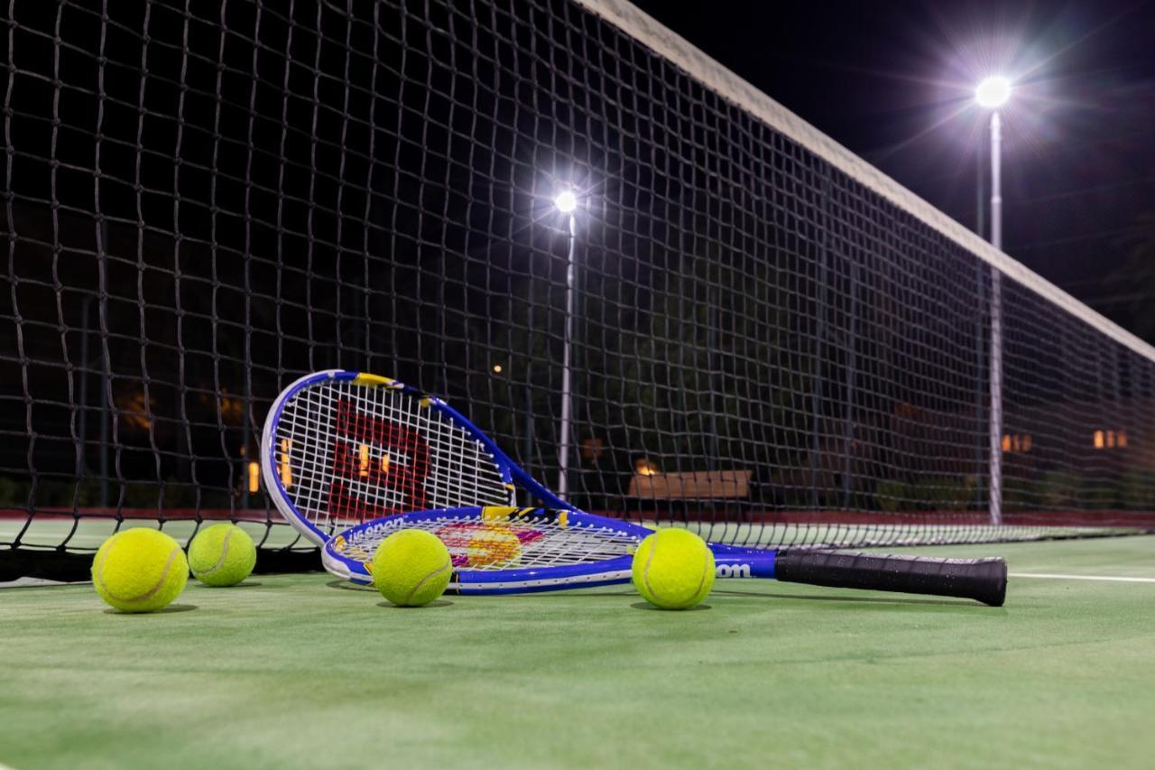 Sealine Beach, A Murwab Resort Mesaieed Esterno foto Tennis balls and racket